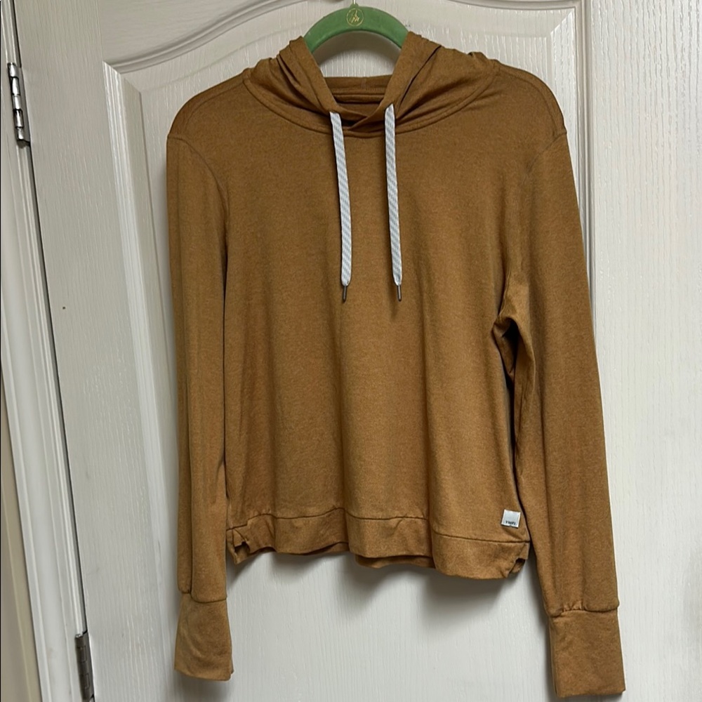 Vuori women's hoodie in camel brown with white drawstrings